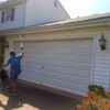 73502-employee-power-washing-garage-door