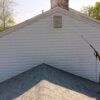 73503-employee-power-washing-siding-peak