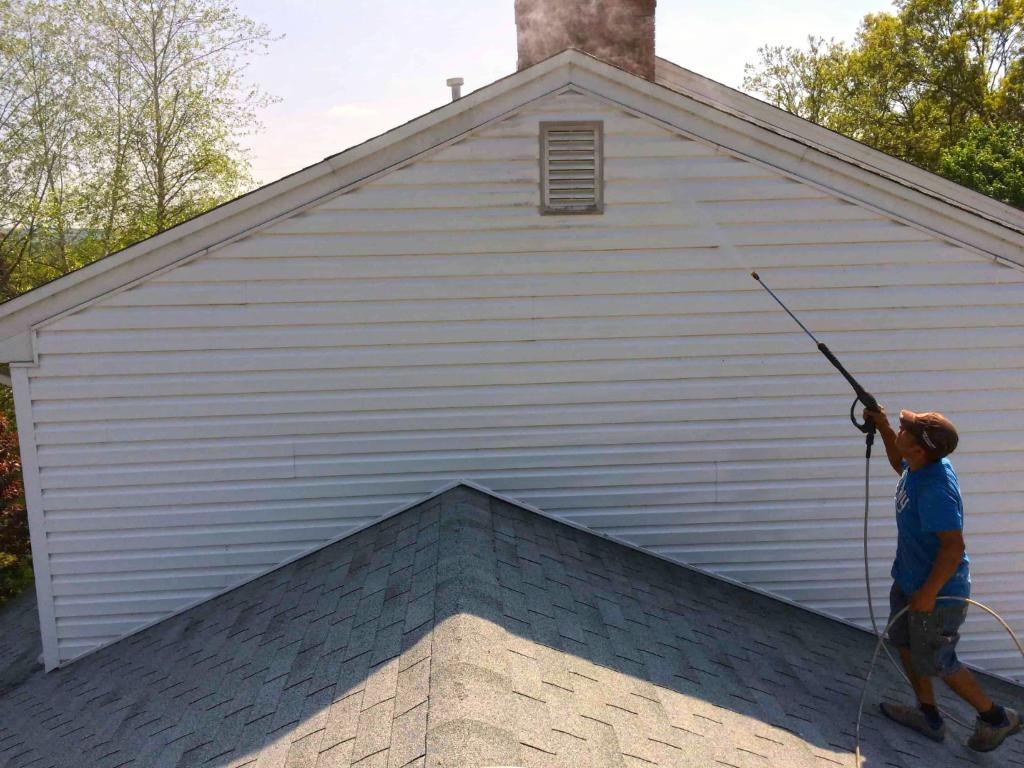 73503-employee-power-washing-siding-peak