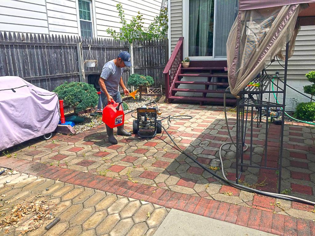 74101-employee-before-power-washing-patio